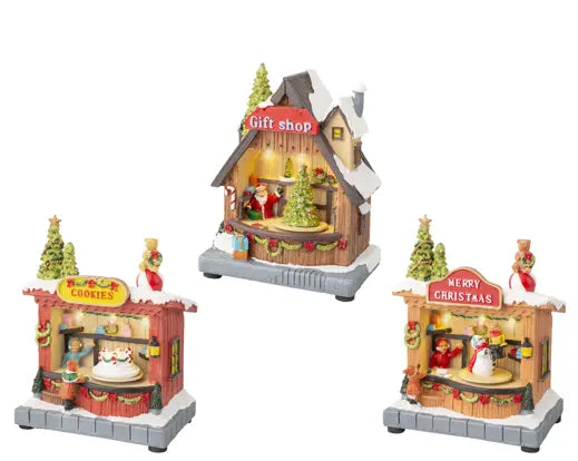 Villaggio Natalizio Luminoso LED con Movimento 3 Modelli Assortiti Merry Christmas Cookies Gift Shop Kaemingk