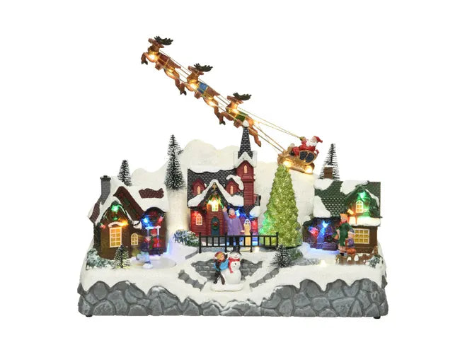 Scenografia Natalizia Luminosa LED di Babbo Natale Santa Claus 14x21x19cm H con Scenografia e Luci Multicolori Colours Multi | Kaemingk